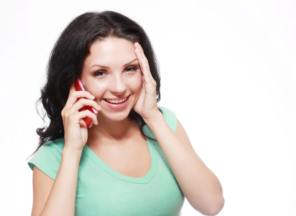 Glimlachende vrouw met smartphone — Stockfoto