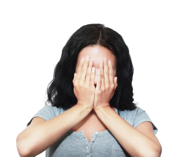 Brunette woman covering face — Stock Photo, Image