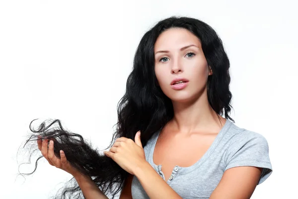 Woman holding hair — Stock Photo, Image