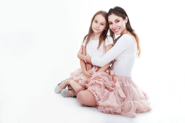 Mother and daughter in same outfits — Stock Photo, Image