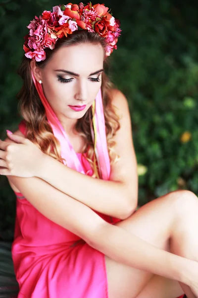 Girl in lotus flowers crown — Stock Photo, Image