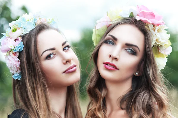 Nymphs in colorful wreaths — Stock Photo, Image