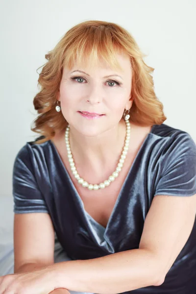 Elegant woman in blue dress — Stock Photo, Image