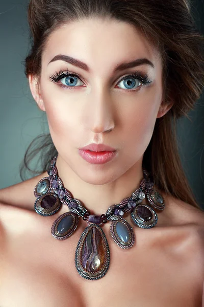 Magnificent woman in jewelry — Stock Photo, Image