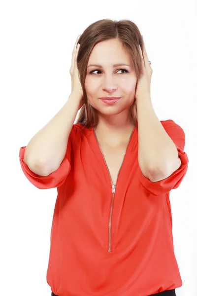 Frustrated woman covering ears — Stock Photo, Image