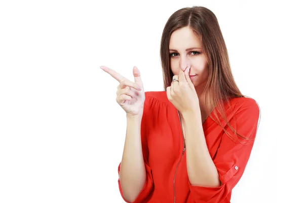 Young woman holding nose — Stock Photo, Image