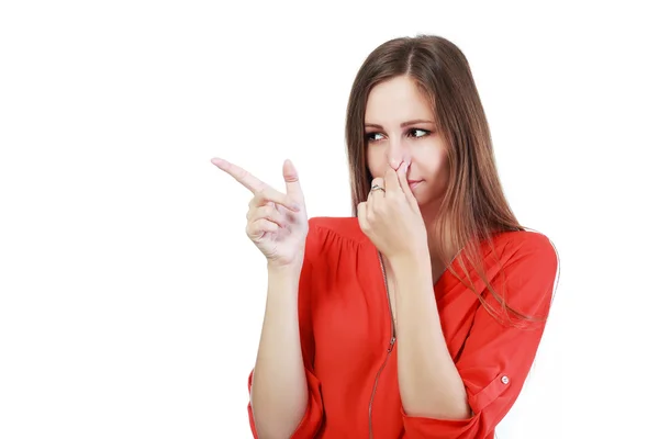 Young woman holding nose — Stock Photo, Image