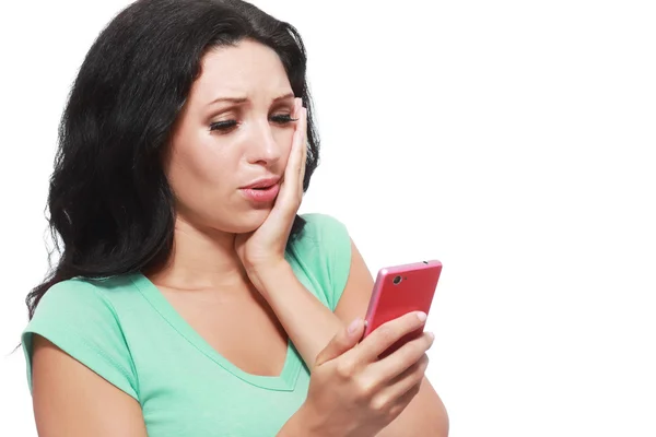 Girl is holding a cell phone — Stock Photo, Image