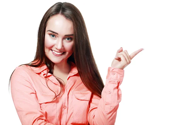 Joven mujer sonriente señalando —  Fotos de Stock