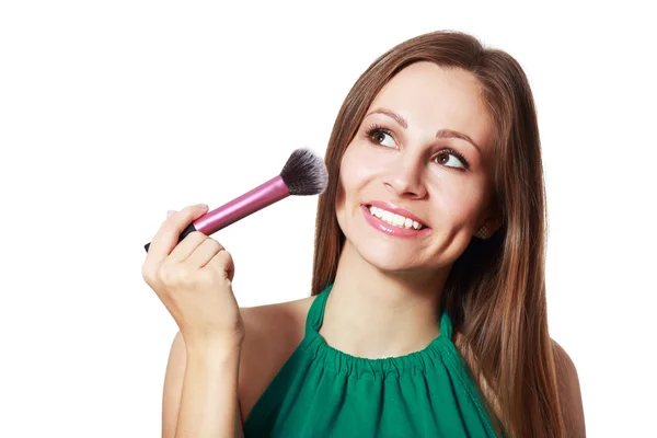 Mujer con un cepillo de maquillaje —  Fotos de Stock