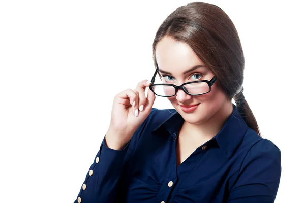 Woman looking over glasses — Stock Photo, Image