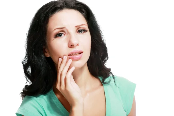 Pretty brunette with a toothache — Stock Photo, Image