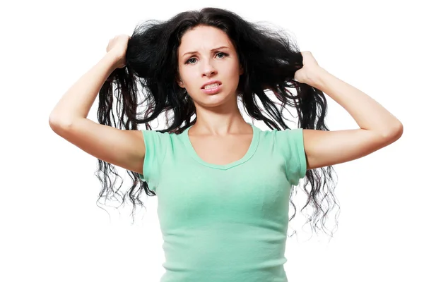 Woman pulling her hair — Stock Photo, Image