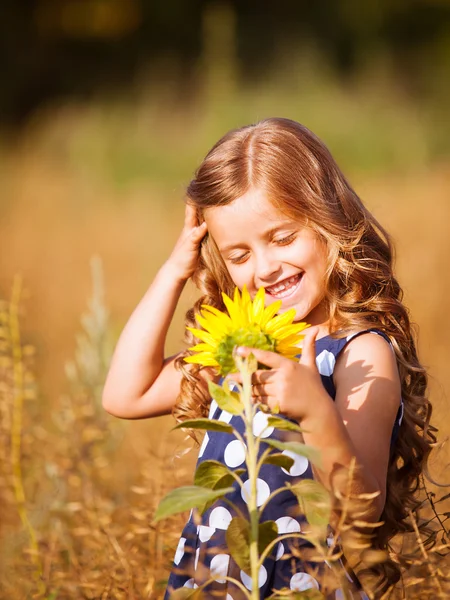 Little golden-haired girl — Stock Photo, Image