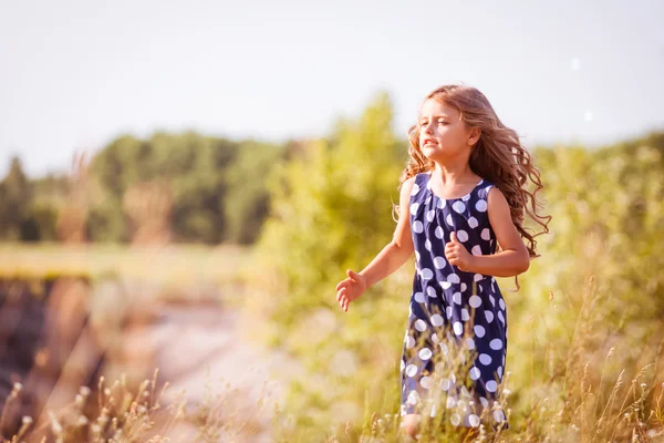 Little golden-haired girl — Stock Photo, Image