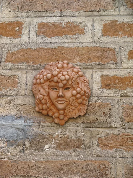 Details of architecture historical buildings. Italy. stone mask. — Stock Photo, Image