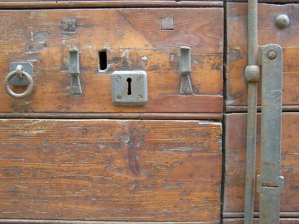 Ancient old dirty wooden door — Stock Photo, Image