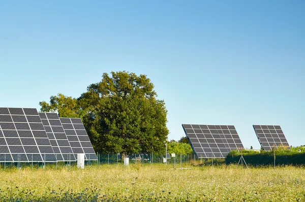 Line large solar panels on the nature — Stock Photo, Image