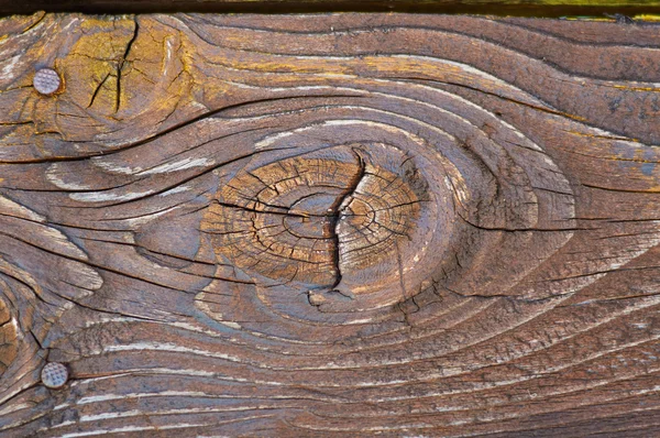 Stare drewniane tło z węzeł — Zdjęcie stockowe