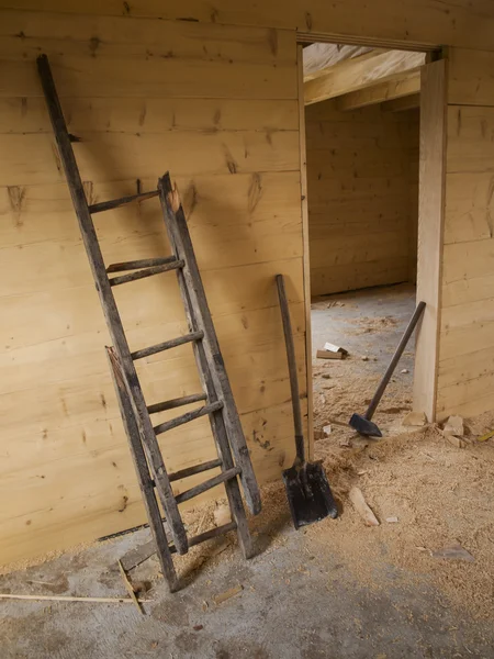 Big hammer, broken wooden ladder, shovel and brush — Stock Photo, Image