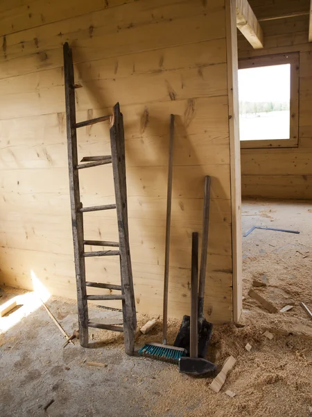 Big hammer, broken wooden ladder, shovel and brush — Stock Photo, Image