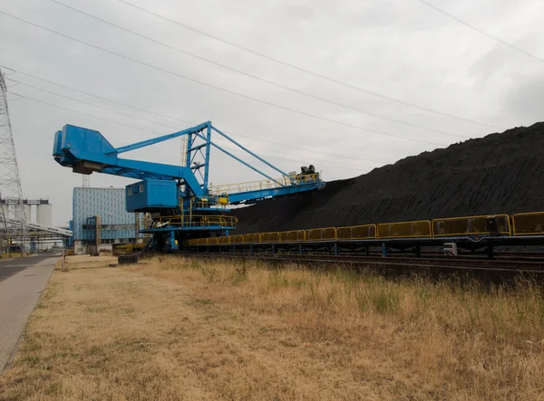 Stacker with a heap of coal — Stock Photo, Image