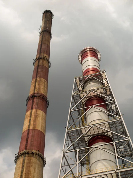 Various chimneys due to the different combustion technology — Stock Photo, Image