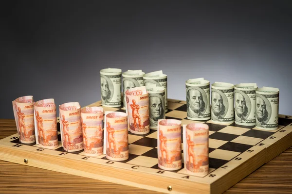 Ruble and dollars on chess board - closeup — Stock Photo, Image