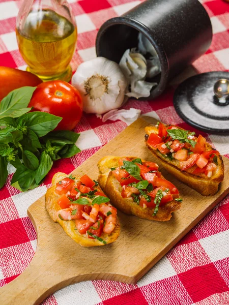 Italian bruschetta with ingredients — Stock Photo, Image