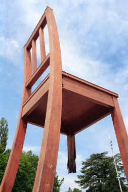 Broken Chair wood sculpture in Geneva clipart