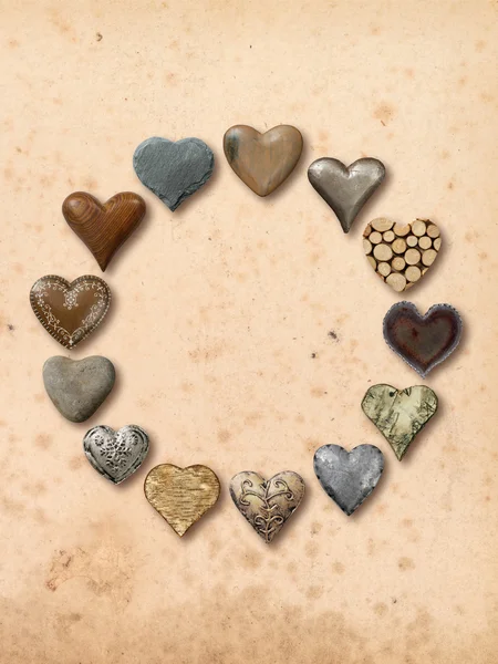 Various hearts in a circle over vintage background — Stock Photo, Image