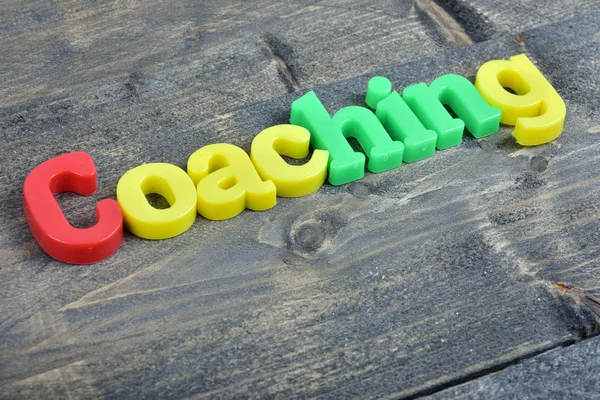 Coaching on wooden table