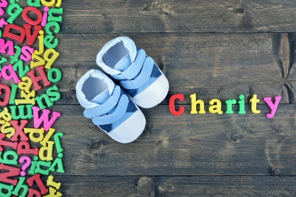 Charity on wooden table — Stock Photo, Image