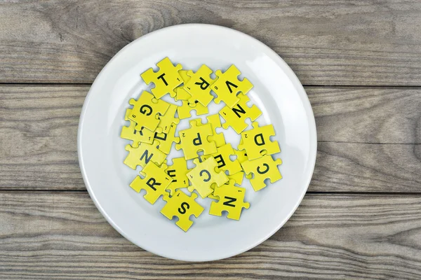 Cartas de puzzle na placa — Fotografia de Stock