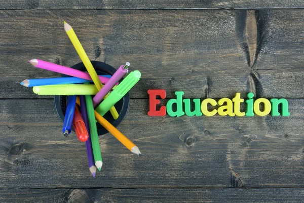 Onderwijs op houten tafel — Stockfoto