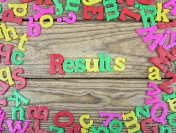 Results on wooden table — Stock Photo, Image