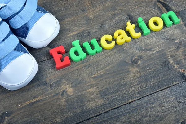 Education on wooden table — Stock Photo, Image