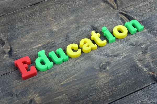 Education on wooden table — Stock Photo, Image