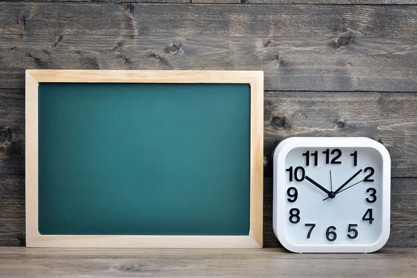 School board on wooden table — Stock Photo, Image