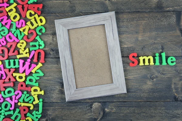 Smile on wooden table — Stock Photo, Image