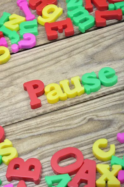 Pause on wooden table — Stock Photo, Image