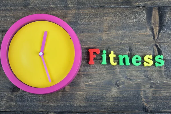 Fitness na mesa de madeira — Fotografia de Stock