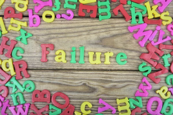 Failure on wooden table — Stock Photo, Image