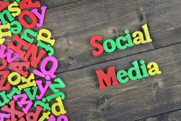 Social Media on wooden table — Stock Photo, Image