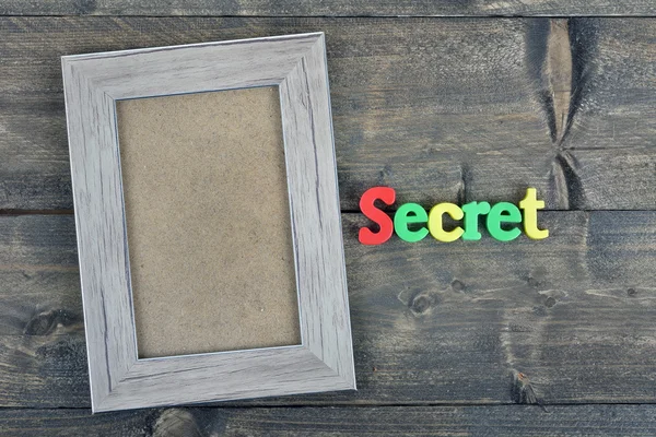 Secret on wooden table — Stock Photo, Image