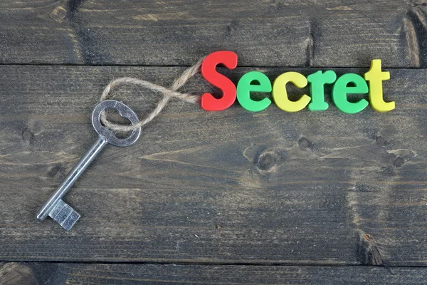 Secret on wooden table — Stock Photo, Image
