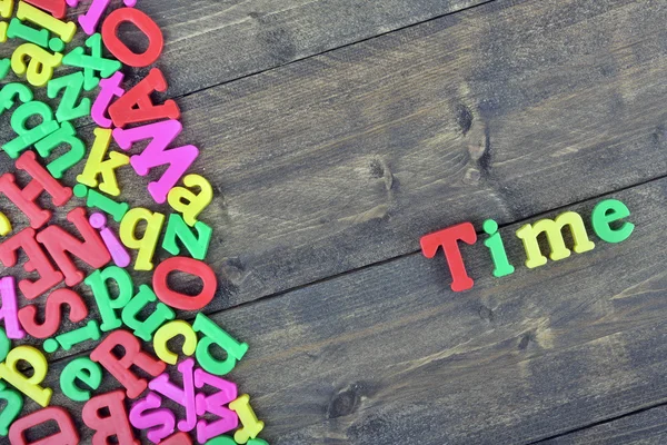 Time on wooden table — Stock Photo, Image