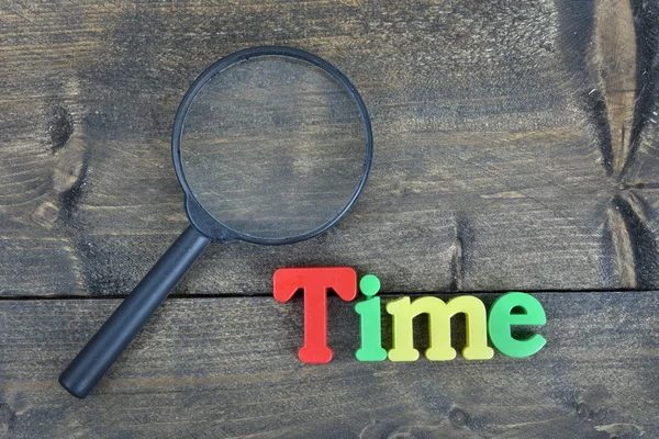 Time on wooden table — Stock Photo, Image