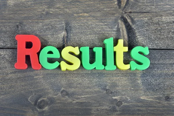 Results on wooden table — Stock Photo, Image