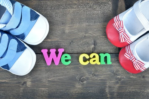 We Can on wooden table — Stock Photo, Image